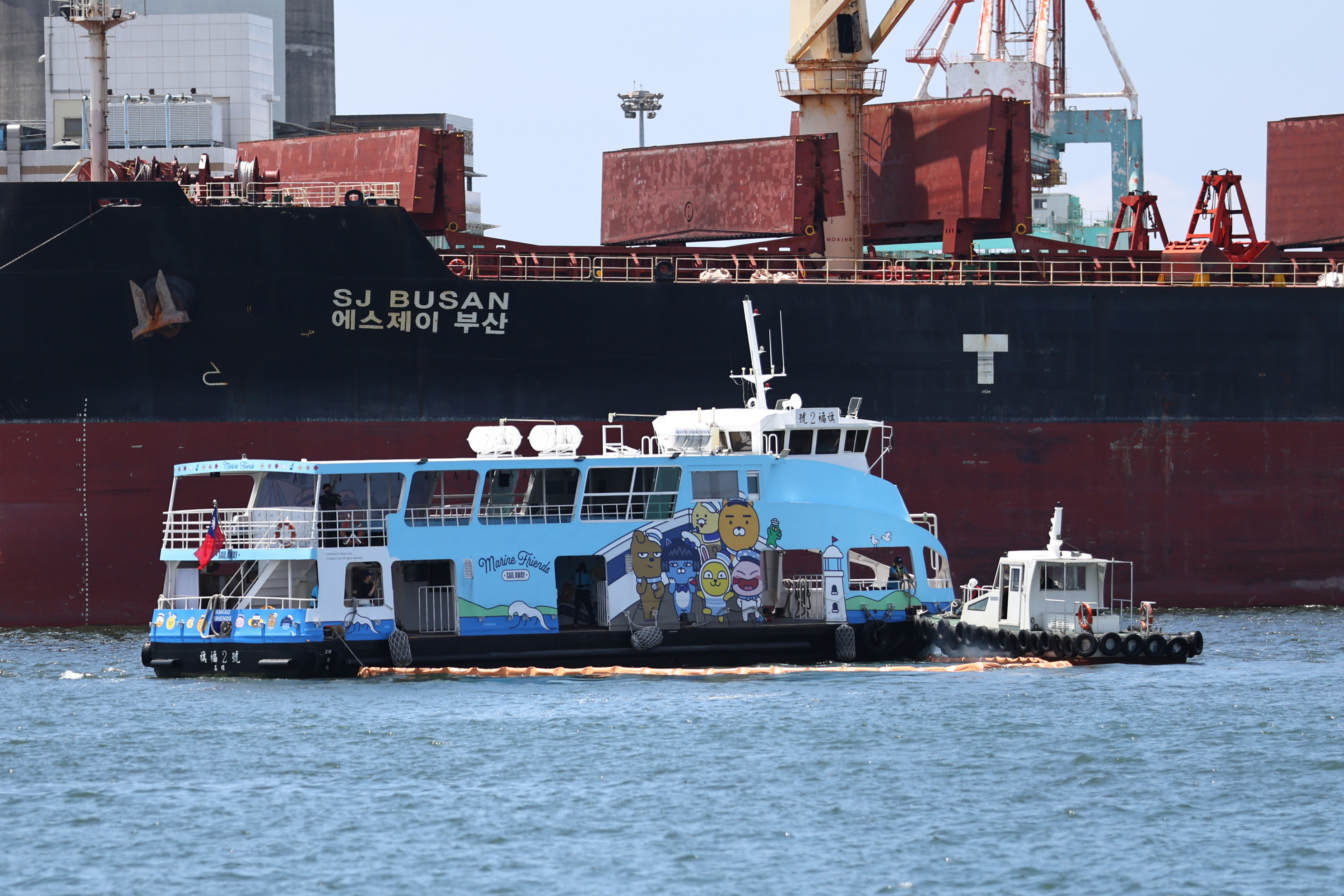 Figure 4. Deployment of oil containment booms on-site.